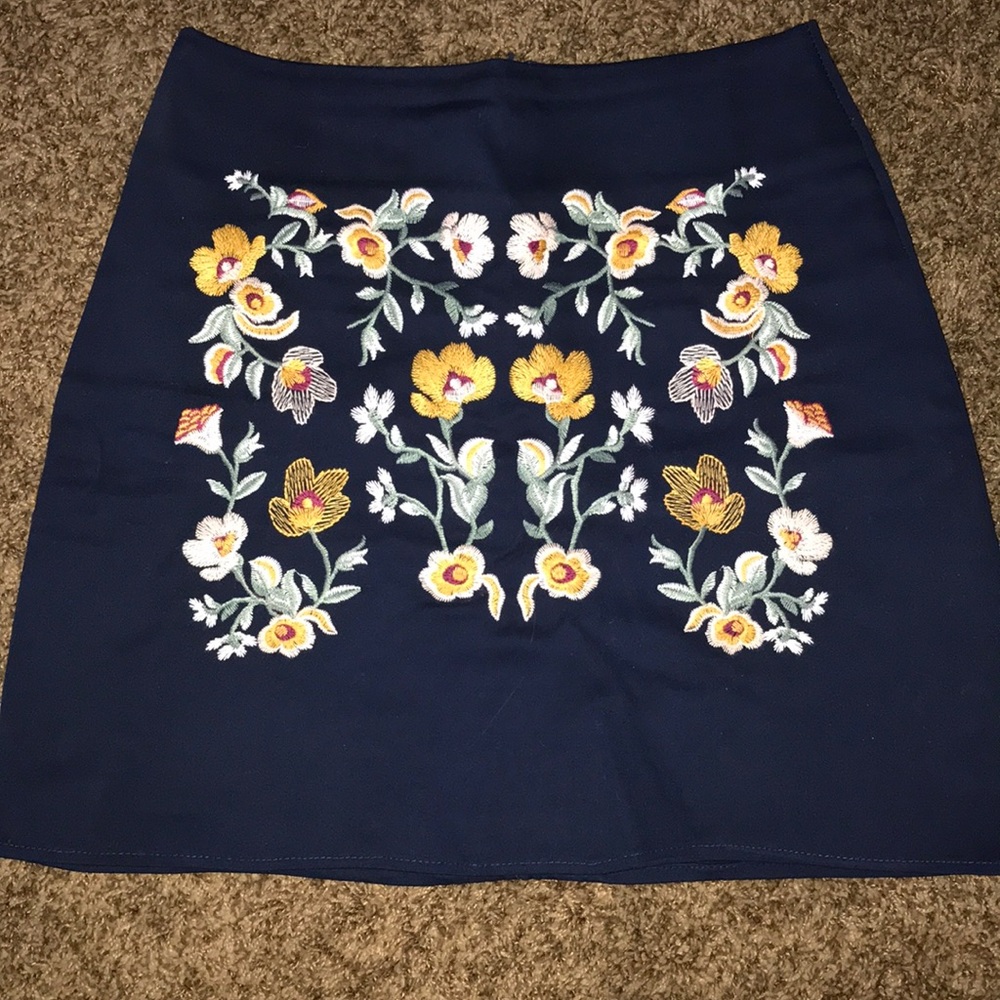 Olive shirt & navy blue skirt with floral designs